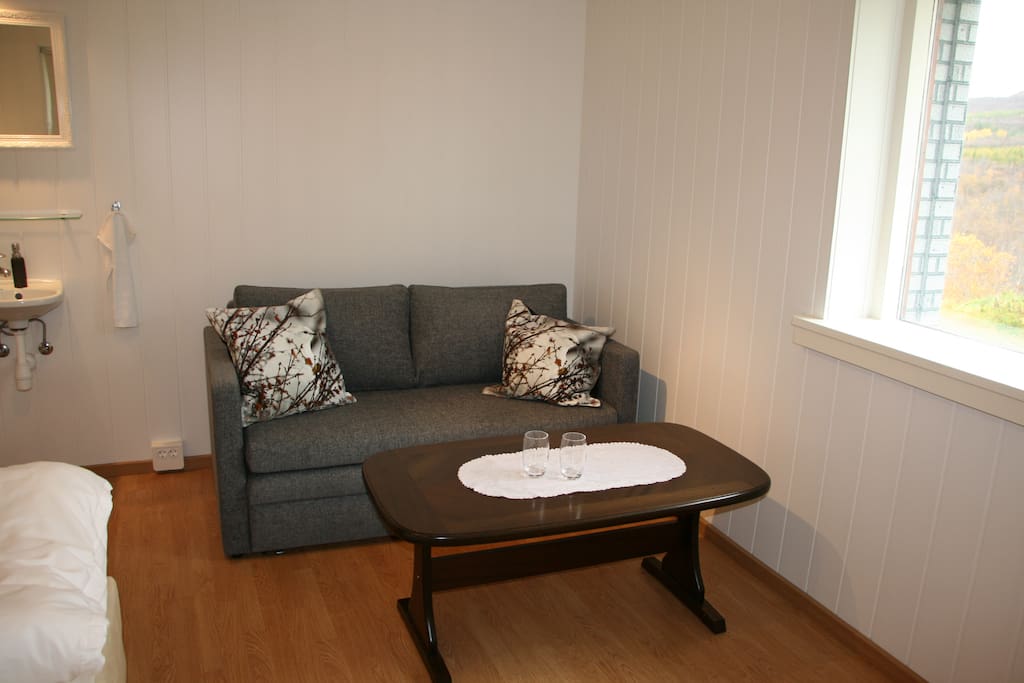 Our quadruple room fits four persons and includes a double/twin bed, a closet and a comfortable pull out couch.