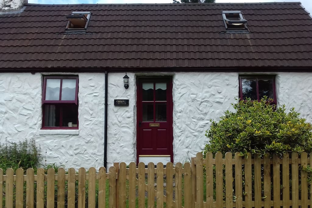 The left window is the living room, the right is the bedroom