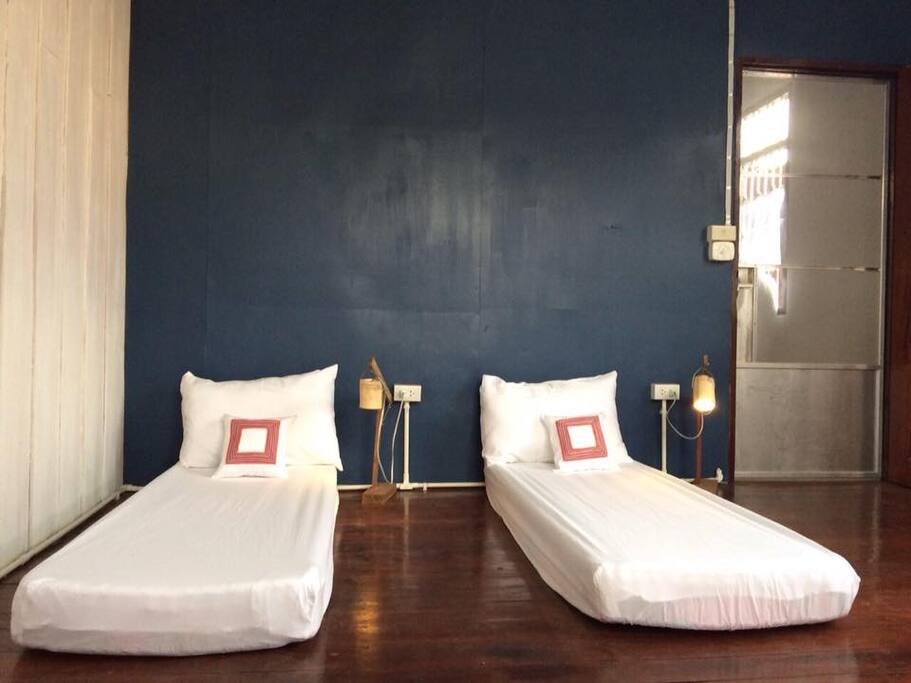 bed in male dormitory room