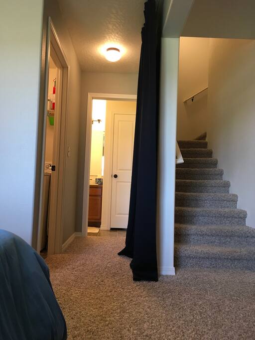 Private bathroom and shared laundry room.