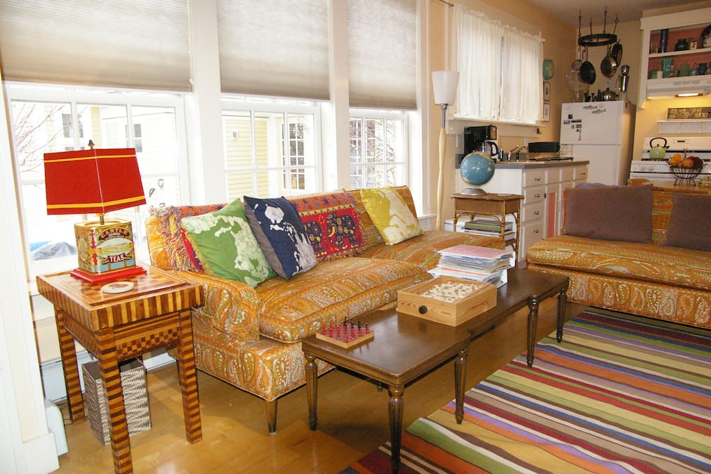 Lots of light. Windows overlook the garden, lawn, and bluestone patio. Two grills, gas and charcoal, for your use. Lawn chairs and chaise-longues, too.