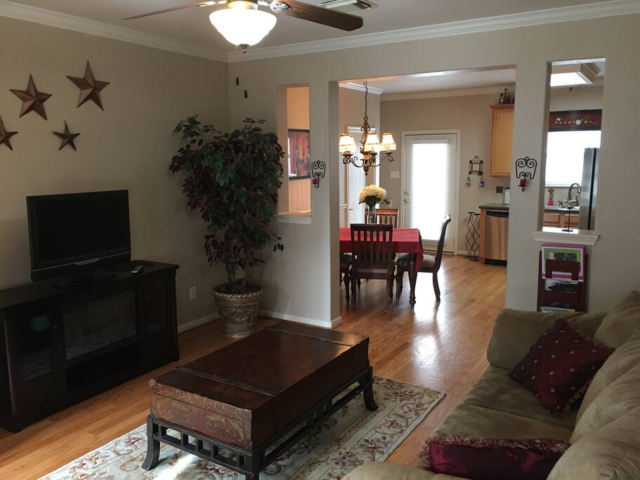 View of living room into the kitchen from the front.
