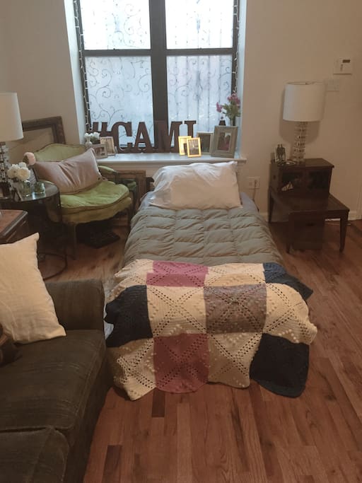 We will provide a twin or queen size air mattress or both to your choice. We provide fresh linen, and clean towels during your stay. This is one example of a twin set up in the living room.