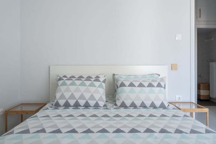View of the queen sized bed.
