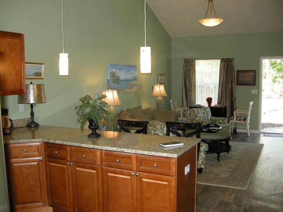 Open airy living, dining and kitchen