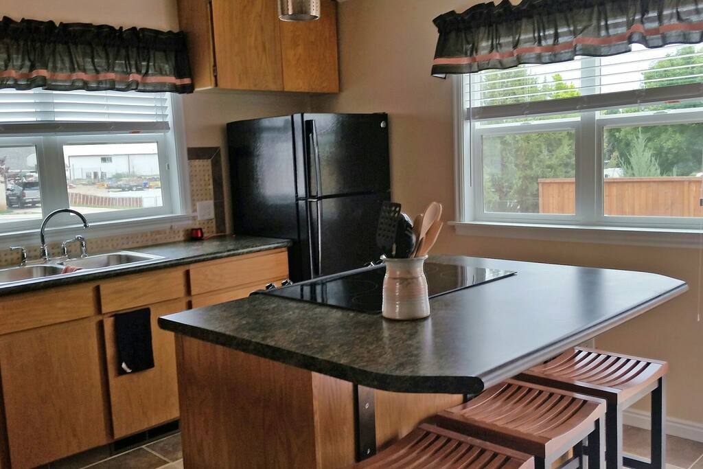 The kitchen is light and airy, with all new appliances and everything you'll need to cook your own meals and snacks.