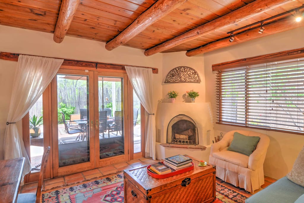 Make use of this wood-burning fireplace in the cold season, or open up the doors and let a cool breeze flow through in the summertime.