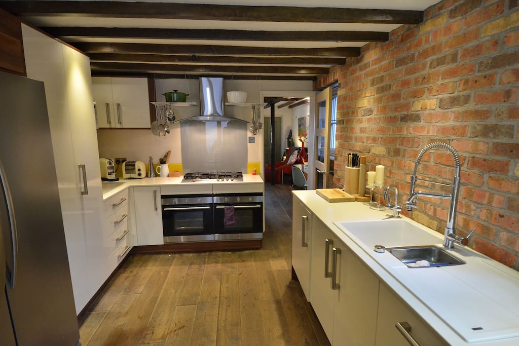 Well equipped kitchen with double oven, Nespresso coffee maker and beautiful tableware