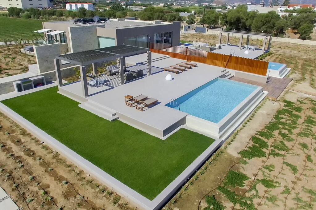 Private beach front villa with infinity pools