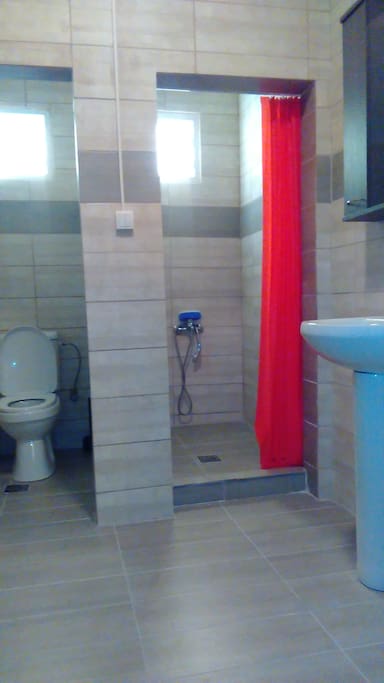 Luminous & spacious 2 seperate built cabins for shower and wc.