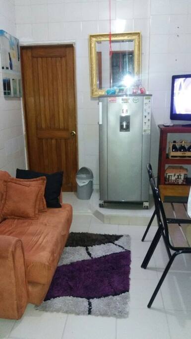 Sofa cama en espacio entre habitaciones