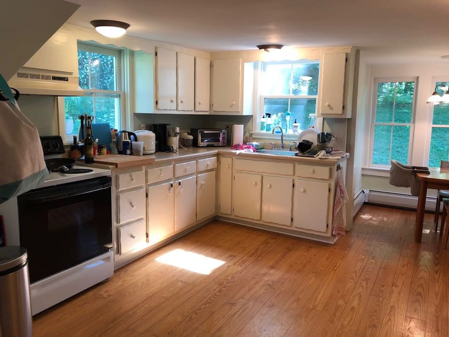 Kitchen contains a breakfast nook with table that seats 4
