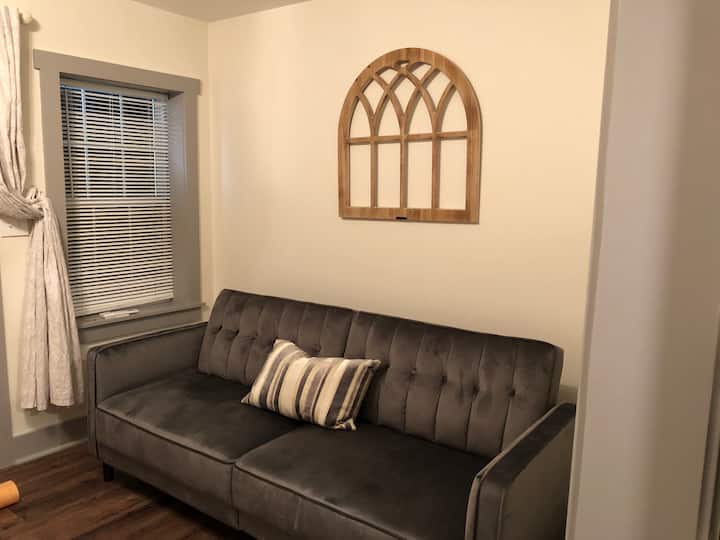 Keeping Room - private sleeping. The back of sofa folds back to flatten for bedding. 