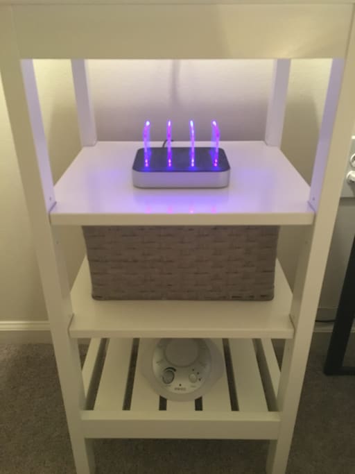 No need to bring a USB cord. This little guy can charge up to three mobile devices at once. Below are the remotes to TV, Cable, and Blu-Ray. Beneath that, is a Sound Machine to drown out sounds you don't have time to get accustomed to. Anything you need; we try to think of everything!