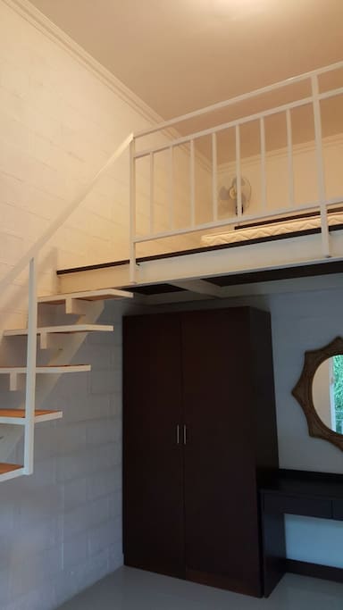 Bed located on the top