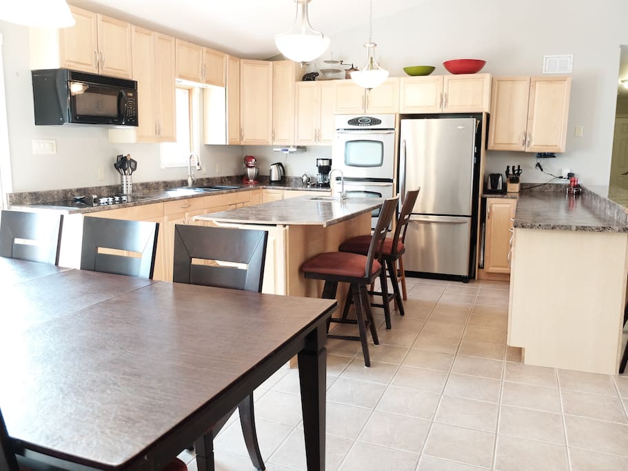 Well equipped kitchen with ample space for guests to cook