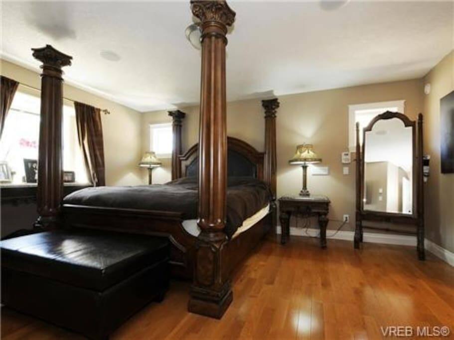 The Master Bedroom w/ ensuite and walk in closet.