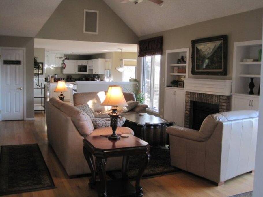 Enjoy our deep seated leather sofas by the gas fireplace.