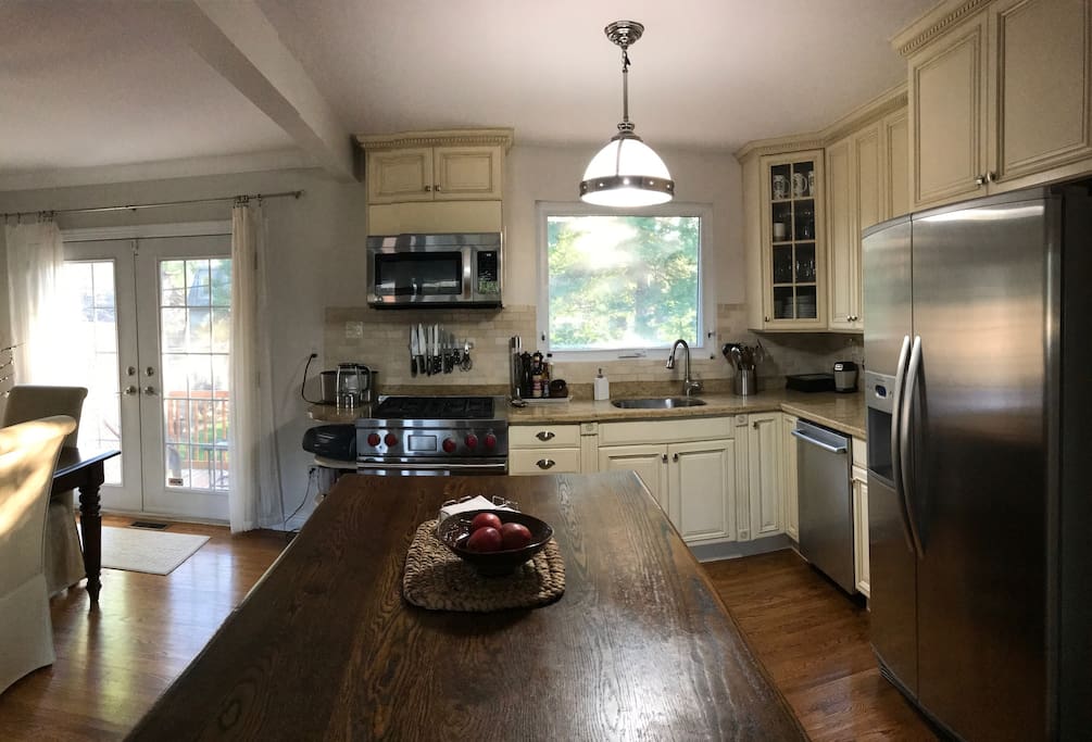 Eat in Kitchen with 2 bar stools. And yes, that is a Wolf stove.