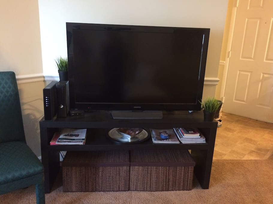 Living room tv with stand- cable and xbox to use during stay