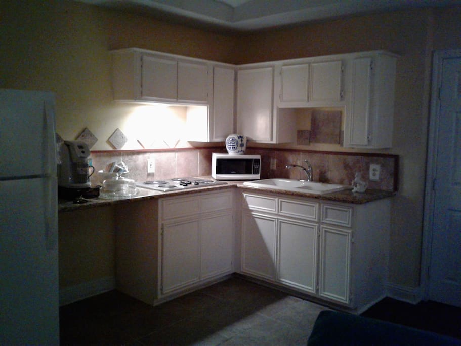 Granite Counter tops and microwave.