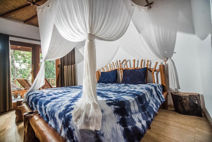 Bedroom #5 by the pool, with 1 double bed, and 2 single beds to accommodate up to 4 people, Bathroom and AC.