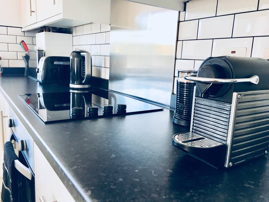 Nespresso machine and cooking hob.
