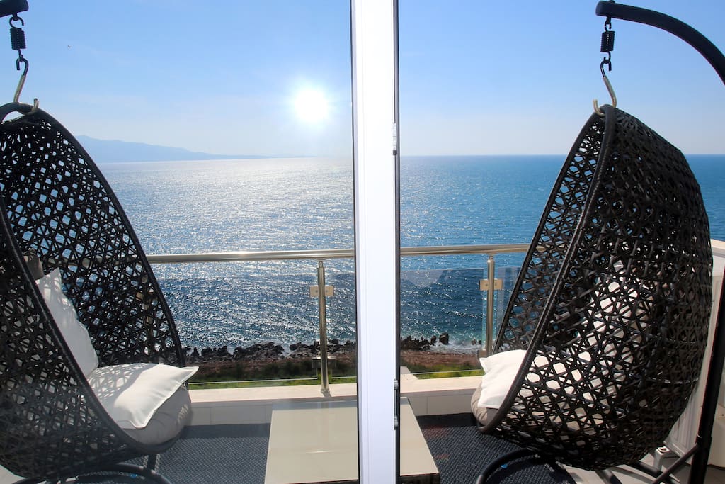 furnished seafront balcony - time to relax