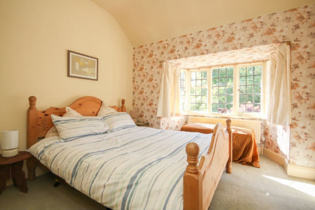 Our sunny double guest room with en-suite.