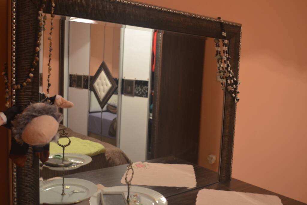 Mirror and reflection of the closet from the mirror