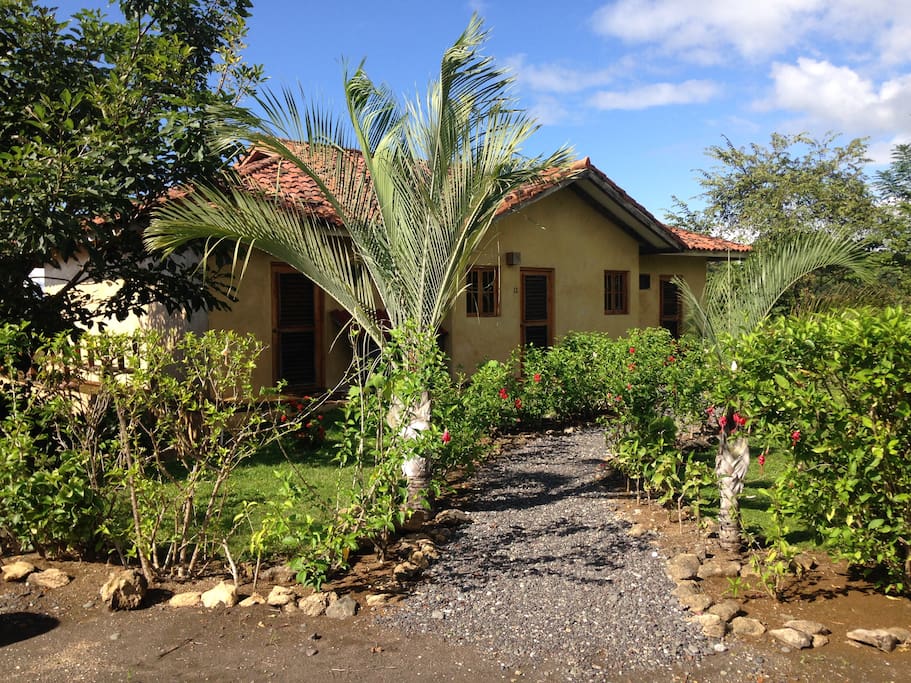 Beautiful gardens add to the privacy of this end of the cul de sac villa.
