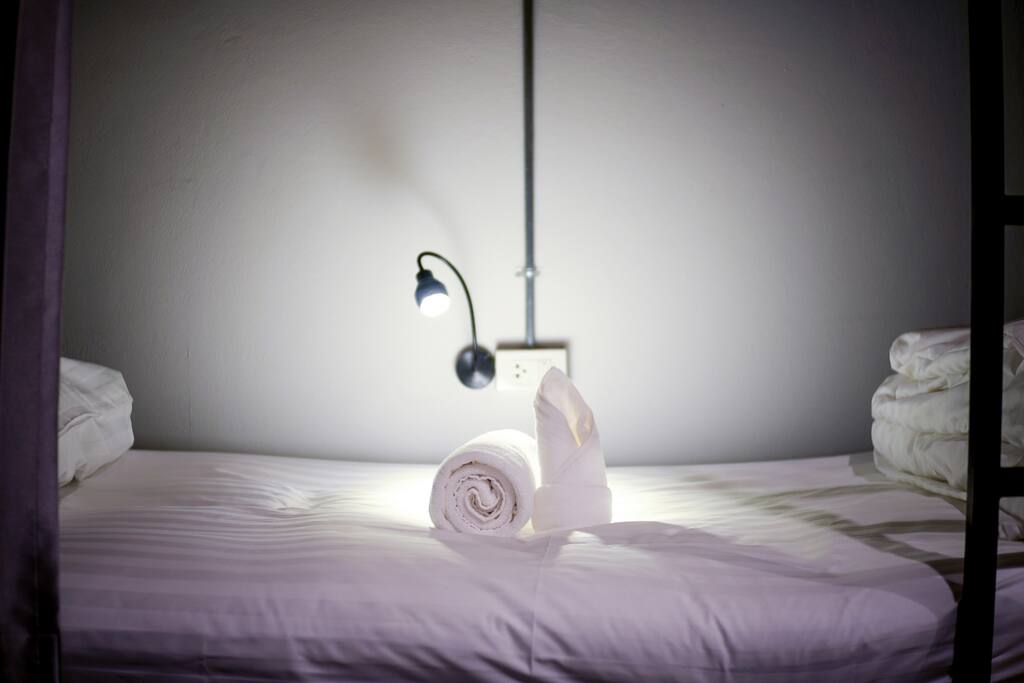 bulk single bed in female dormitory room