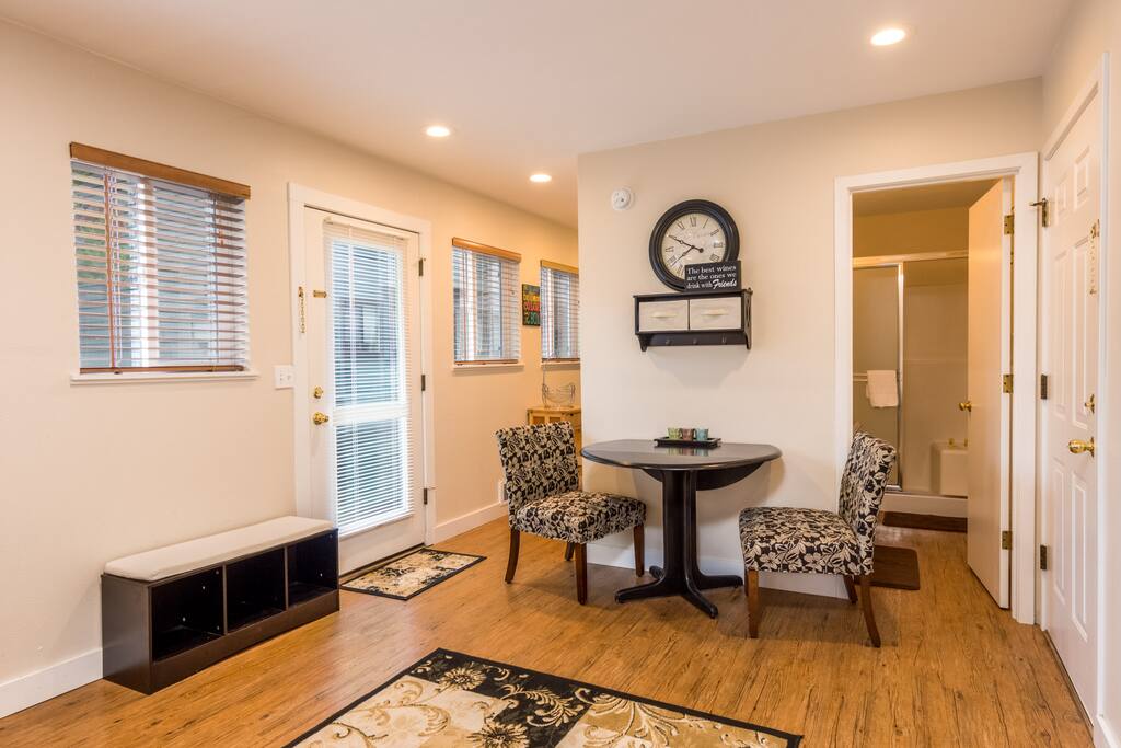 Beautiful laminate, wood flooring. Lots of brand new windows for the sunshine to pour in.