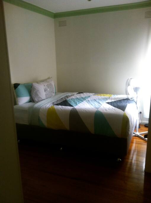 Bedroom 2. Mirrored Wardrobes. Small window with blinds.