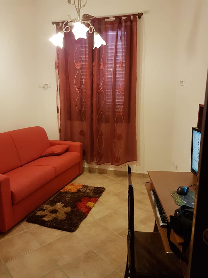 ห้องนอนพร้อมเตียงโซฟา