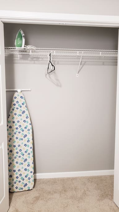 Spacious closet, with iron & board