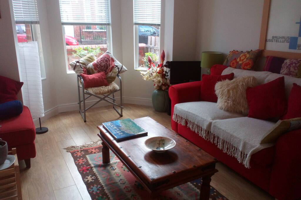 Living room with TV and bed settee