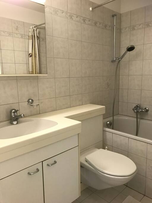 The bath room has a bath tub