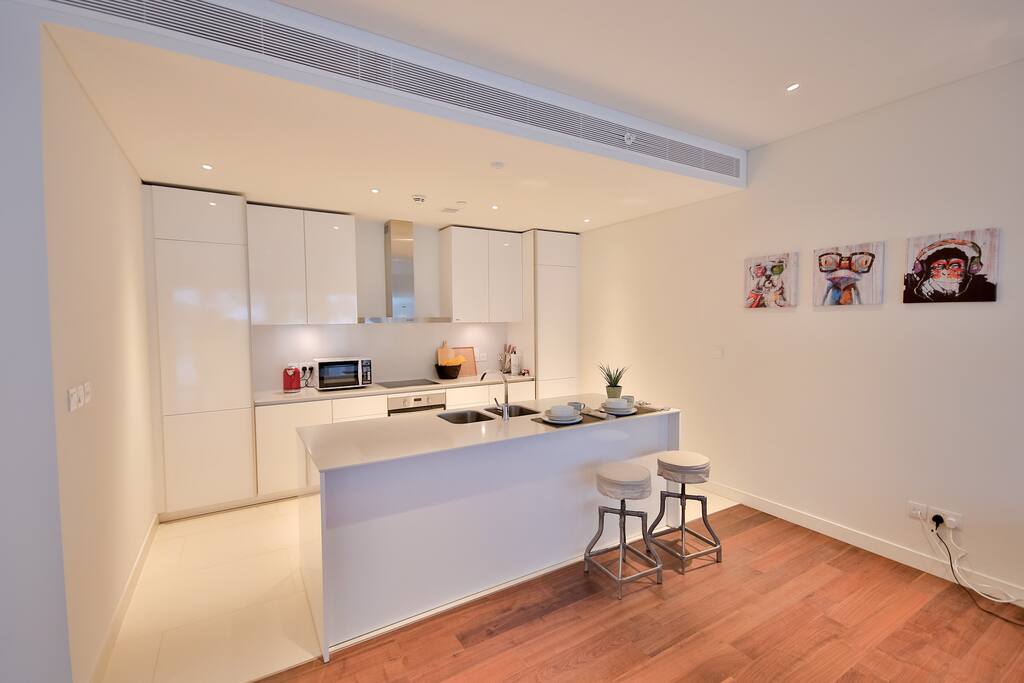 Full kitchen with bar for dining