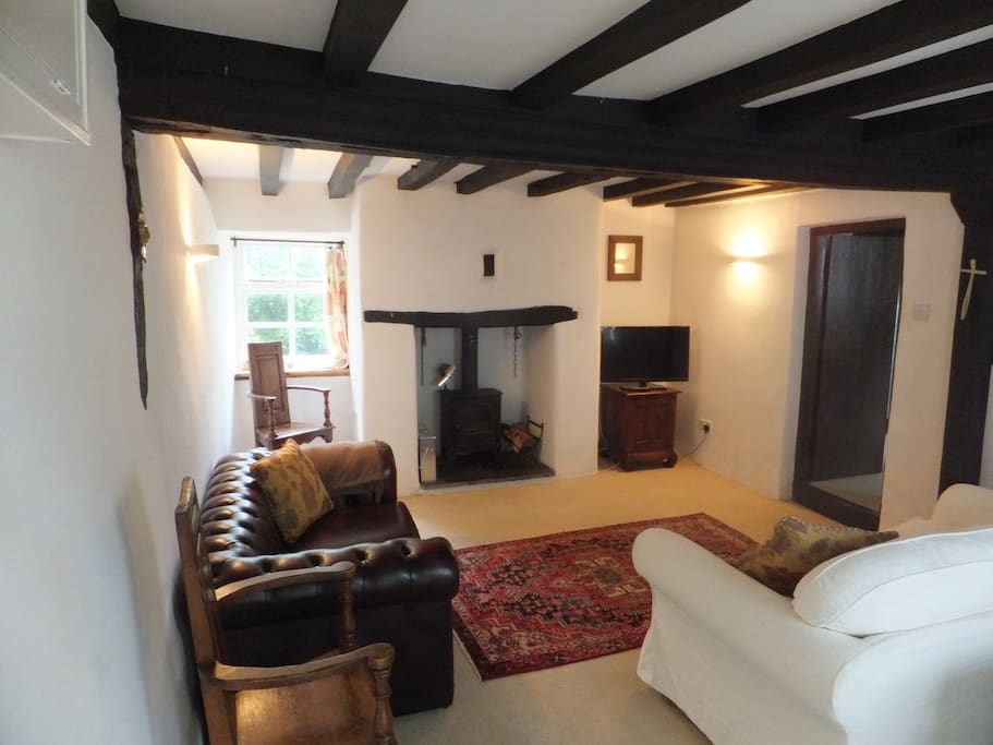Comfortable sitting room full of character!