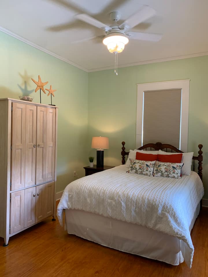 The Osprey:
The Osprey sleeps two people in one queen sized bed.  This room also has ample storage space with a small closet, luggage rack and armoire.