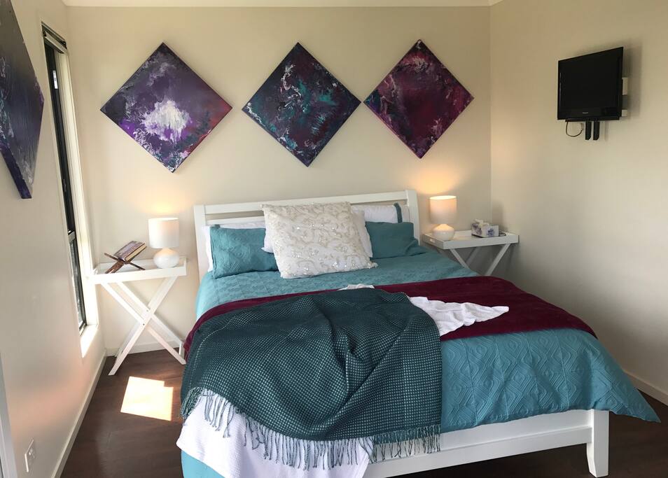 Bedroom, tv and artwork