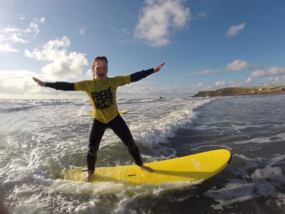 Surfing on the beach at Widemouth bay