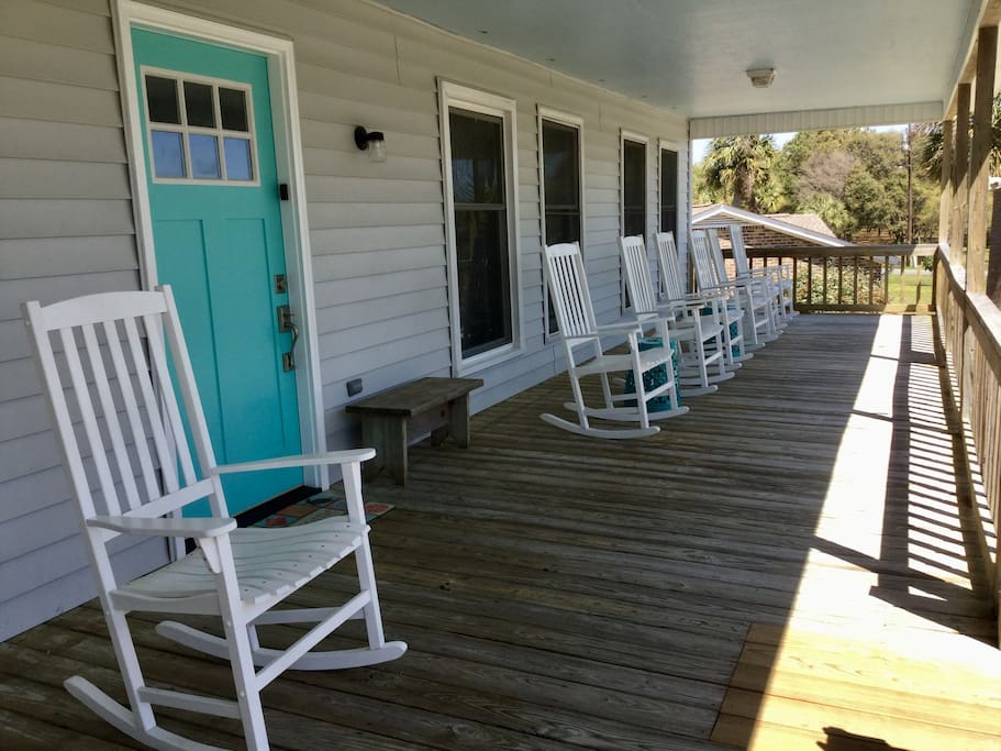 Enter via your own personal code. The front porch is gated and is a nice place to gather be it for breakfast, lunch happy hour or dinner. Relax and sit back in one of our 9 rockers or double swing.