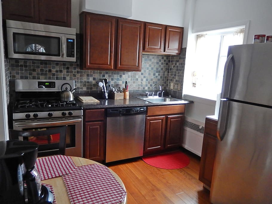 Updated kitchen with dinette set for 2, coffeemaker, coffee, tea, accessories, and more provided