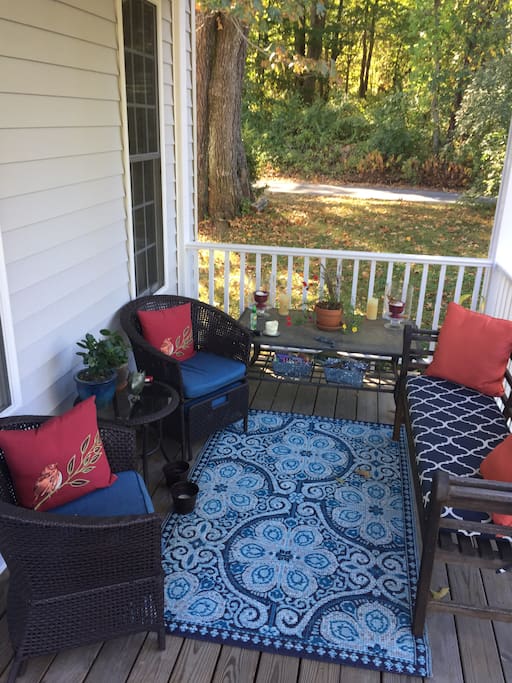 Porch chairs have slide out ottomans
