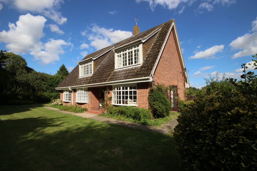 Surrounded by countryside and nestled down a private lane.