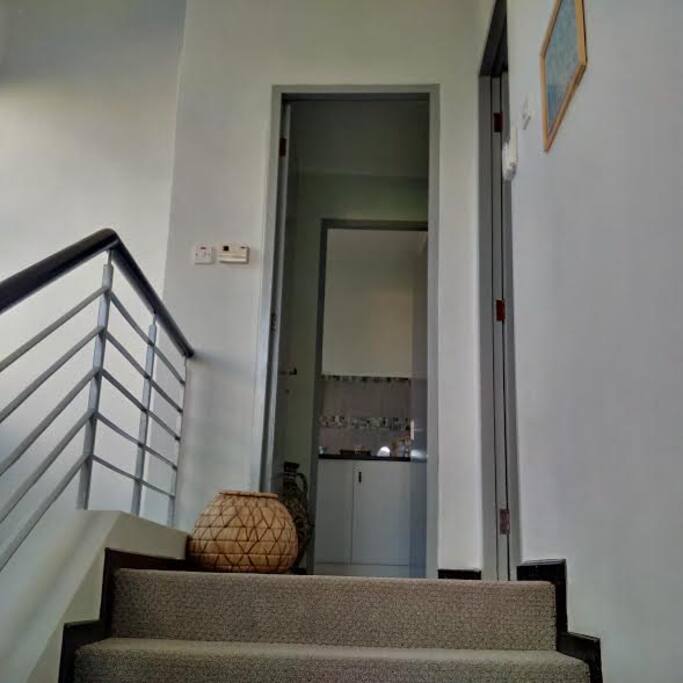 View to the top landing with bedroom and bathroom