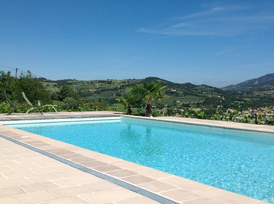 Swimmingpool terrace with view on Nyons