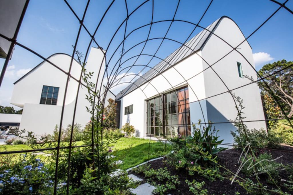 Steel arbor at entrance to studio loft.